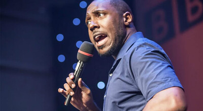 aurie styla holding a microphone